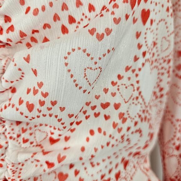 NWT BCBGeneration Heart Print Flutter Waist Peplum Sheer Fluted Sleeves Top M - Picture 6 of 13